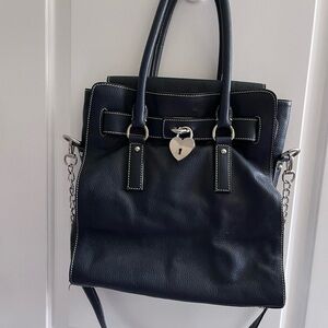 Custom leather navy Buti bag.